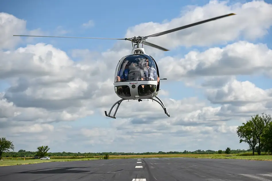 A helicopter taking off at TruFlight Academy